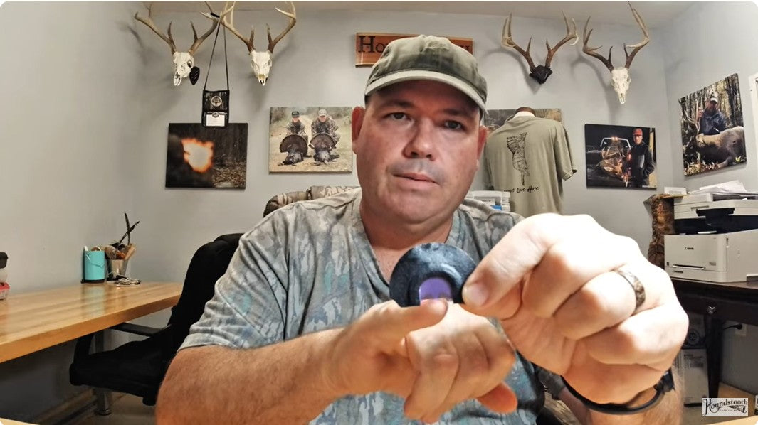 Owner of Houndstooth Game Calls demonstrating how to cluck and purr on turkey mouth calls
