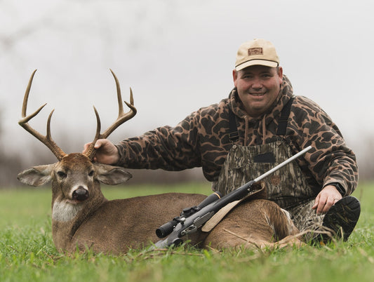 Lyle, maker of handmade in the USA deer grunt calls with a buck he called and shot